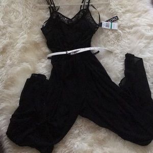 Brand new black one piece XOXO outfit.